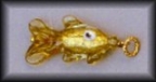 Handmade, Gold Fish shaped pendant, with 24 Karat Gold foil inside